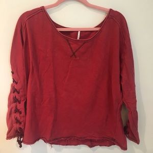 Red laced free people sweatshirt